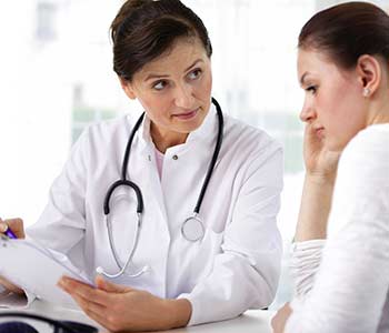 Woman speak with a Lady doctor